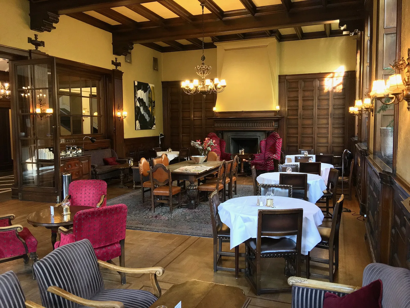 Snug interior at Knavewick, low lamps and whisky shelves